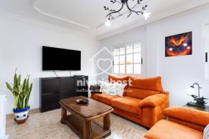 TV a/nebo společenská místnost v ubytování Ave Fénix San Isidro, by Nivariahost