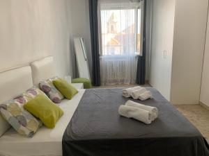 Postel nebo postele na pokoji v ubytování Residenza Piso 23