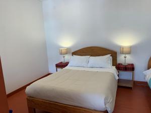 Hospedaje Killipata客房内的一张或多张床位