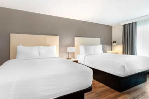 Postel nebo postele na pokoji v ubytování Best Western Plus Rancho Cordova Inn