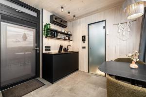 Η κουζίνα ή μικρή κουζίνα στο Heathland Lodge