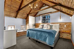 Postel nebo postele na pokoji v ubytování Escape Beach Cottage in Dwarskersbos + 90 fotografií