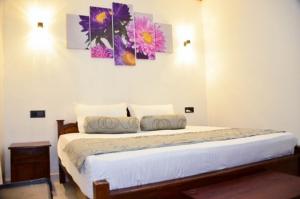 Postel nebo postele na pokoji v ubytování Villa 22 Negombo