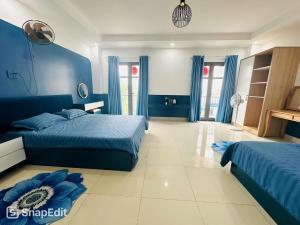 Giường trong phòng chung tại Khách Sạn Tây Ninh LaNa