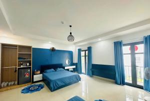Giường trong phòng chung tại Khách Sạn Tây Ninh LaNa