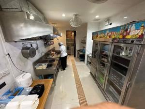 Kuchyň nebo kuchyňský kout v ubytování Kata Beach Poshtel Phuket