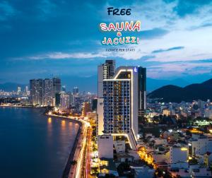 a view of a city at night at Boton Blue Hotel & Spa in Nha Trang
