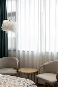 Uma cama ou camas num quarto em 乌镇闲情逸致精品民宿