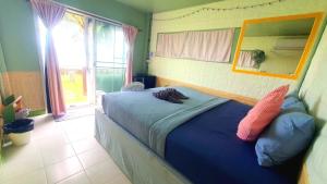 Postel nebo postele na pokoji v ubytování Kohchang 7 seaview bungalow + 37 fotografií