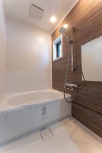 Koupelna v ubytování 鱗町庵 + 28 fotografií