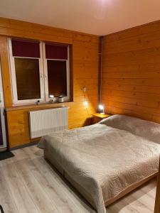 Postel nebo postele na pokoji v ubytování U Stefanów