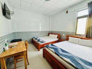 Postelja oz. postelje v sobi nastanitve Hotel Sen Việt Bạc Liêu