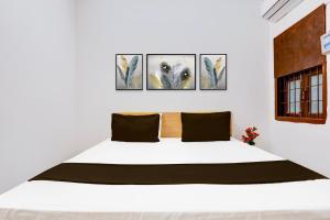 Postel nebo postele na pokoji v ubytování Hotel O HOTEL SHYAM RESIDENCY
