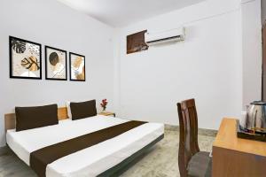 Postel nebo postele na pokoji v ubytování Hotel O HOTEL SHYAM RESIDENCY