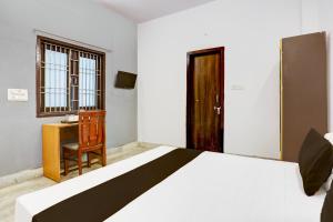 Postel nebo postele na pokoji v ubytování Hotel O HOTEL SHYAM RESIDENCY