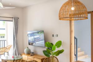 TV o dispositivi per l'intrattenimento presso Anse Boudin Chalets