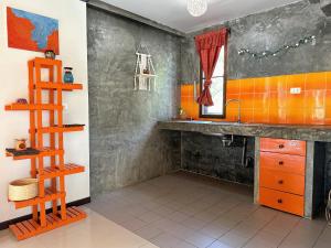Kuchyň nebo kuchyňský kout v ubytování Pairadise Hotel