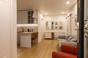 A cozinha ou kitchenette de Guesthouse of Manoni Ratiani