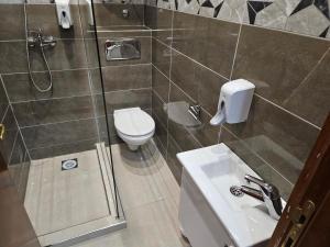 Baðherbergi á Prenociste Rooms Simke