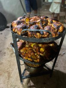 a pile of food on top of a grill at RADISSON lUXURY RUM CAMP in Wadi Rum +58 photos