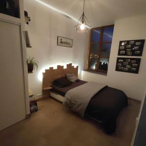 Ένα ή περισσότερα κρεβάτια σε δωμάτιο στο Appartement 45 m +1 φωτογραφίες