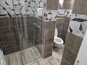Baðherbergi á Prenociste Rooms Simke