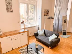 Posezení v ubytování LEND - Design Apartment 2
