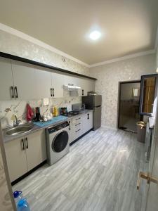 Η κουζίνα ή μικρή κουζίνα στο Lovely home