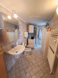 Kuchyň nebo kuchyňský kout v ubytování Luminoso bilocale con terrazzo vista panoramica