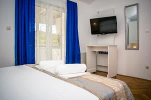 Posteľ alebo postele v izbe v ubytovaní Villa Promajna 4 + 36 fotografií