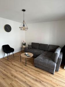 Posezení v ubytování Modern eingerichtete 2 ZimmerWhg