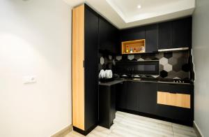 Kuchyň nebo kuchyňský kout v ubytování Space Quality Apart Hotel + 14 fotografií