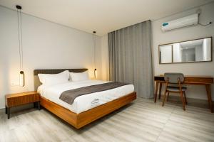 Voodi või voodid majutusasutuse Space Quality Apart Hotel toas