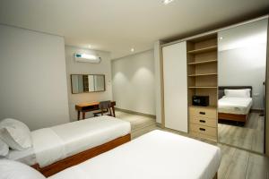 Voodi või voodid majutusasutuse Space Quality Apart Hotel toas