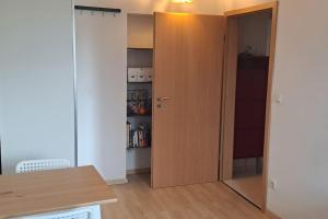 a kitchen with a door to a pantry at 2 Zimmer Nähe Messe, Lanxess-Arena in Cologne