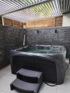 Fotografie z fotogalerie ubytování Les Pieds Dans l'Eau face à la mer des caraïbes Jacuzzi Sainte-Luce Trois-Rivières v destinaci Sainte-Luce
