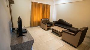 Ruturaj Inn Alibag的休息区