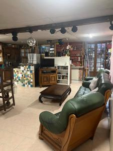 Posezení v ubytování Maison dans une grange