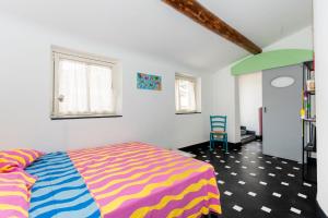 Postel nebo postele na pokoji v ubytování Luccoli31