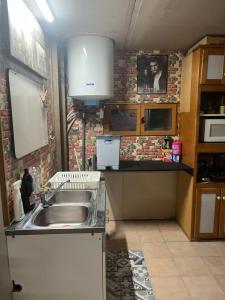 Kuchyň nebo kuchyňský kout v ubytování Maison dans une grange