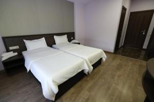Cama o camas de una habitación en Riverside Hotel