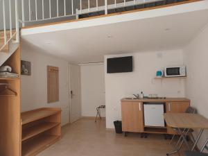 TV a/nebo společenská místnost v ubytování Loft House Budapest