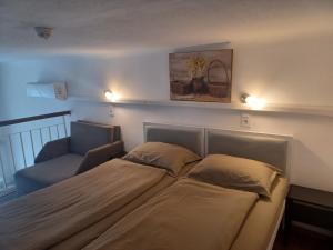 Postel nebo postele na pokoji v ubytování Loft House Budapest