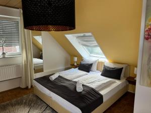 Postel nebo postele na pokoji v ubytování Hotel SchlossStuben