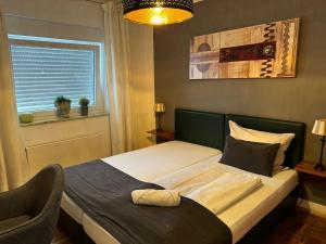 Postel nebo postele na pokoji v ubytování Hotel SchlossStuben