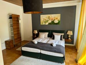 Postel nebo postele na pokoji v ubytování Hotel SchlossStuben