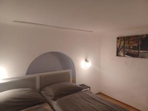 Postel nebo postele na pokoji v ubytování Loft House Budapest