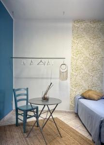 Postel nebo postele na pokoji v ubytování Vigevano Studios + 4 fotografie