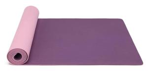 a purple yoga mat with a pink yoga mat at Fitzrovia Apartment By Morethanstays in London