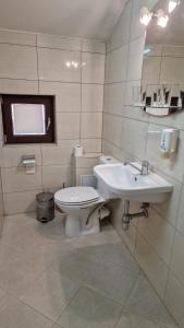 Koupelna v ubytování Guest House Garbevi